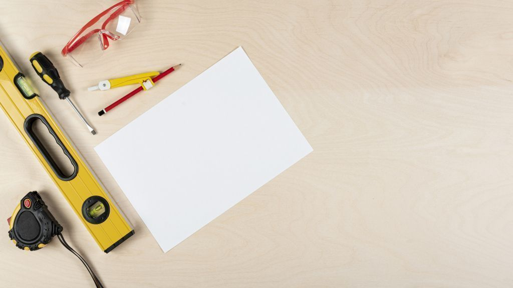top-view-of-builder-desk-with-paper-mock-up.jpg лист